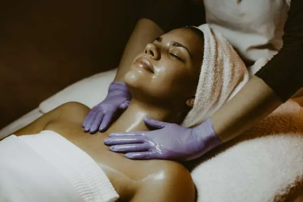 Massage therapy treatment session at Palm Wellness Center